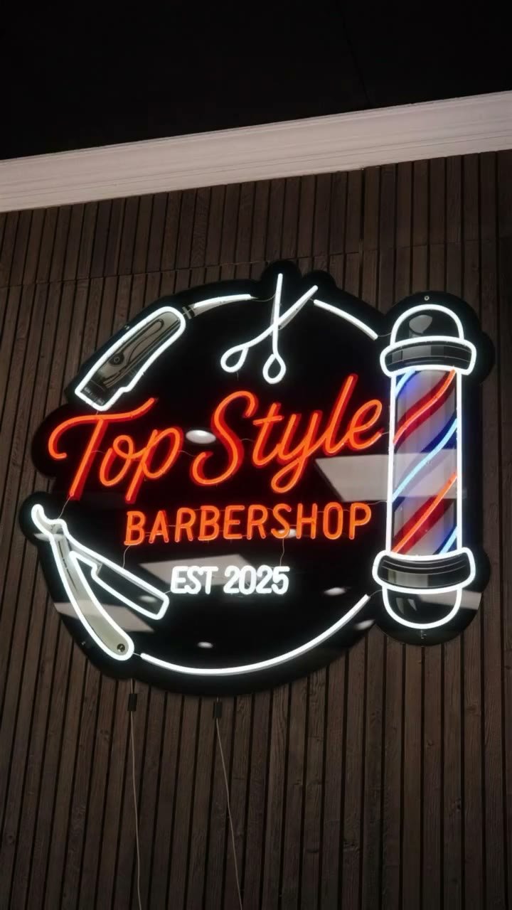 The Top Style neon sign, glowing
